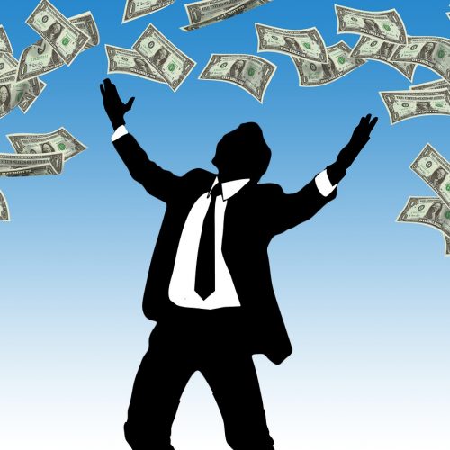 Operating capital rains on a businessman.