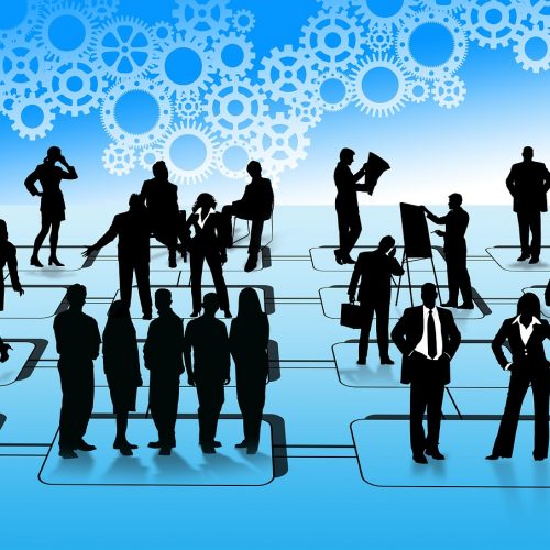 A group of salespeople celebrating the completion of a custom made sales CRM system.