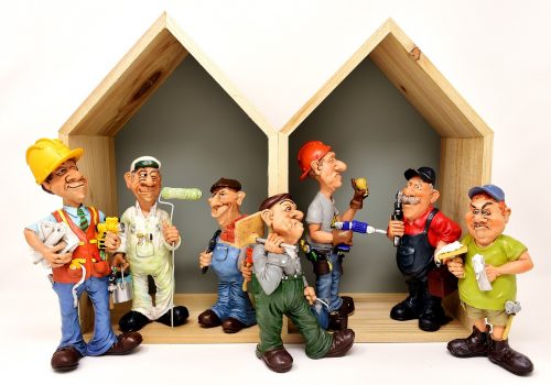 A group of contractors waiting to receive commercial construction financing.