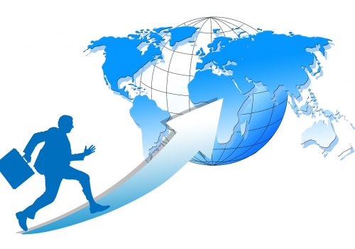 A businessman ready to expand his business throughout the world after securing a business expansion loan.